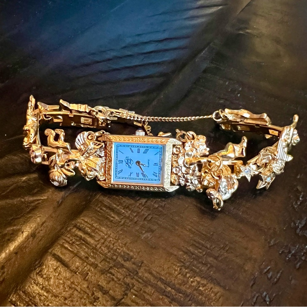 Vintage Kirk’s Folly “Secret of 7” angels watch.